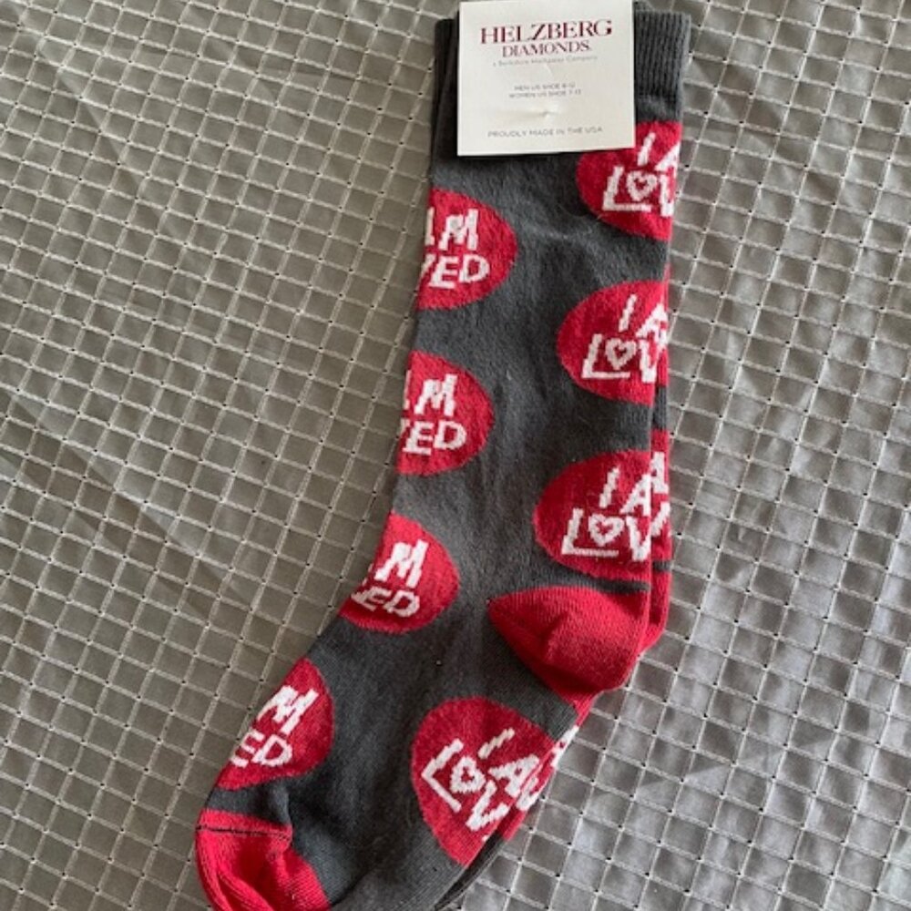 Helzberg Diamonds socks new men size 6 to 12. Women size 7 to 13